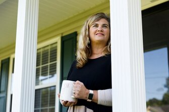 Jana Binns, a 4th grade math and science teacher at Ooltewah Elementary, stands on her front porch in Ooltewah.