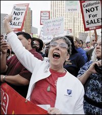 Members of United Teachers Los Angeles join in a march 16 protest outside a fund-raiser in the the city for Gov. Arnold Schwarzenegger.