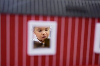 Areli Garcia, 3, works at a center inside his classroom 10 at ECDC Reed, a Head Start program in Tulsa, Okla.