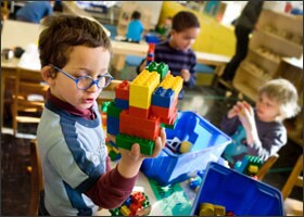 Pablo Greene, 5, left, plays with Legos at the Earth School in New York City. Child advocates warn that unstructured playtime is being squeezed from the school day.