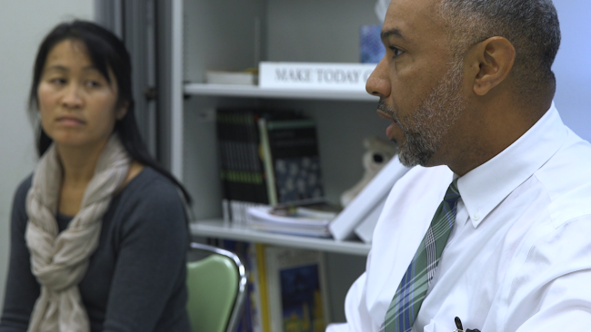 Tim Cotman and Wendy Maitland, co-sponsors of the Cohort and United Minority Girls college-going programs, meet in a Wakefield classroom in the fall of 2019.