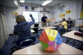 At Naperville Central High School, ball playing is used to keep students alert in a special literacy class.