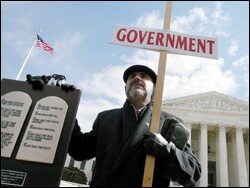The Rev. Tony Espinoza leads a prayer outside the Supreme Court.