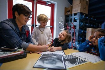 Kindergarten teacher Kimberly Calhoun and her students write scripts, in which students discuss the “best part” about themselves.
