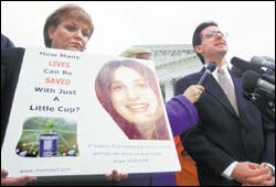 Lawyer Graham Boyd, representing the ACLU challenges the drug tests, right, and Sharon Smith, mother, a supporter of the tests