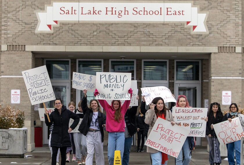 Students and teachers from East High School in Salt Lake City walk out of school to protest the HB15 voucher bill, on Wednesday, Jan. 25, 2023. Several years of pandemic restrictions and curriculum battles have emboldened longtime advocates of funneling public funds to private and religious schools in statehouses throughout the country.