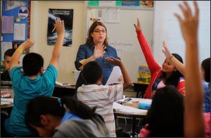 Heather Wolpert-Gawron, a language arts teacher, works with her 7th graders at Jefferson Middle School.