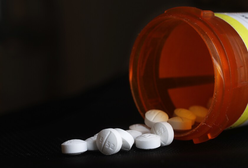 An arrangement of Oxycodone pills in New York, pictured on Aug. 29, 2018. A new study shoots down the notion that medical marijuana laws can prevent opioid overdose deaths. Chelsea Shover of Stanford University School of Medicine and colleagues reported the findings Monday, June 10, in Proceedings of the National Academy of Sciences.