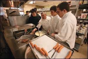 Villages High School is a "charter school in the workplace," meaning only kids whose parents work for the developer or its affiliates may enroll. Juniors at VHS must declare a major, such as culinary arts or health occupations, and even core academic subjects include business lessons.
