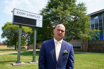 Dr. Nikolai Vitti, superintendent of Detroit Public Schools Community District, speaks during an interview outside Cody High School in Detroit on Aug. 20, 2021.