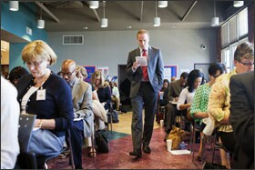 Brian Pick, the head of teaching and learning for the District of Columbia, leads a close-reading exercise during a leadership academy at Easter High School attended by principals and regional superintendents in the school system.