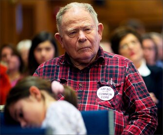 Ray Harney of Rockville, Ind., lets his feelings be known about the common core while attending a public hearing at the Indiana State Library in Indianapolis.