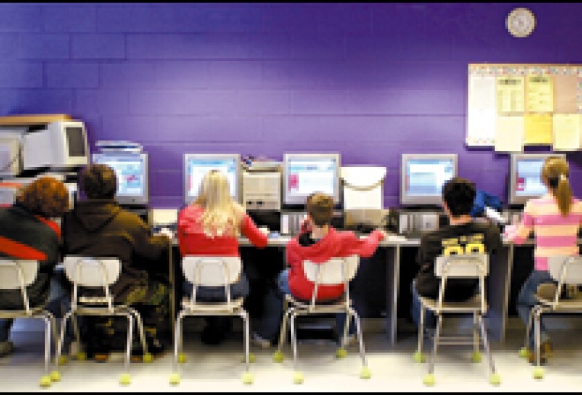 Sophomores at Riverside High School in Belle, W. Va, log onto a Following the Leaders lesson last month. The Kanawha County school district is using the program in all of its schools.