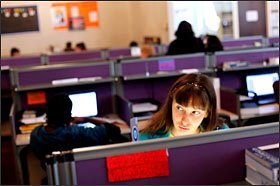 Kristina Andreyeva, 18, works in her cubicle at San Francisco Flex Academy. Students work on courses independently online and must take responsibility for organizing their own school day to get all of their work done.