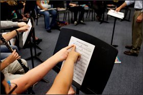 Students point to the beginning of a musical measure during Atticus Hensley's band class at East Middle School in Tullahoma Tenn. on Sept. 12.