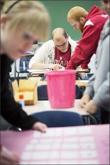 Students at Madison Consolidated High School in Madison, Ind., work through math problems in a "readiness" course that aims to prepare them for college-level math classes.