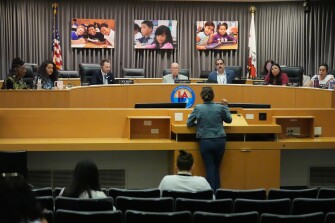 Los Angeles Unified School District board members listen to parent Diana Guillen, center, giving public comments during a meeting at LAUSD headquarters before a special closed session with LAUSD Superintendent Alberto Carvalho, on Feb. 26, 2026, in Los Angeles.