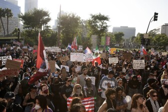 Protesters rally during a demonstration in response to a series of U.S. Immigration and Customs Enforcement (ICE) raids throughout the country in Los Angeles, on June 11, 2025.