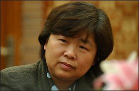 ANOTHER TIME: During the Cultural Revolution, officials decided for Chen Jian Xiu that she would be a Chinese-literature teacher. Today, she teaches the same subject at Peizeng High School in Guangzhou.