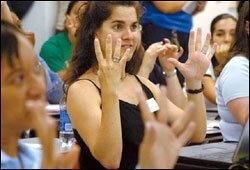 Marjorie Guisasola Hough, a 1st grade teacher in Miami, gets advice on differing learning styles from a member of the National Board Certified Teachers of Miami-Dade during a recent workshop.