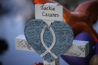 Jackie Cazares' cross stands at a memorial site for the victims killed in this week's shooting at Robb Elementary School in Uvalde, Texas, Friday, May 27, 2022.