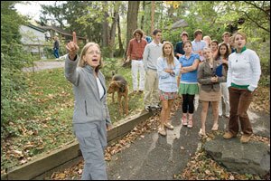 Millbrook School environmental science teacher Jane Meigs takes her students into Trevor Zoo for a species identification lesson.