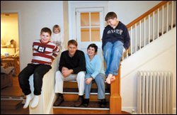 Jonathan and Shelley Midura lived in a house slated for demolition in Arlington, Va., after having to evacuate their New Orleans home along with their children, Redding, right, Justis, and Sophie.