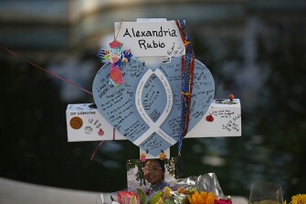 Alexandria Rubio's cross stands at a memorial site for the victims killed in this week's shooting at Robb Elementary School in Uvalde, Texas, Friday, May 27, 2022.