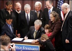 President Bush signs the IDEA law.