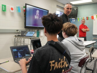 Working on IDs! Social Studies teacher Simon Sharick supervises students at the Plymouth High School in Ohio on how to properly prompt the Gemini Ai App to get their desired information. Students were using the Gemini App for the first time on Friday.Sharick is seeing here working with Antonio and Noah
