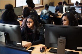 Sophomores Lauryn Ivy, left, and Alante Klyce are new to programming. But during an introductory computer science course at Chicago's Lindblom Math & Science Academy, they designed an app to address one of their most pressing challenges: keeping the girls' bathroom clean. The progress in the city’s schools "gives me chills," said Brenda Wilkerson, the former head of the district's computer science initiative.
