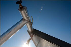 Silver City Consolidated Schools, in New Mexico, got $357,500 under the American Recovery and Reinvestment Act to install a solar hot-water heating system and other energy-saving features. The solar equipment, shown in closeup, supplies almost all the hot-water needs of the high school's campus, top, including the kitchen, showers, and lavatories.