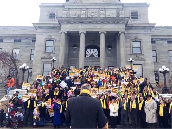 Jeff Laszloffy of the Montana Family Foundation speaks to a crowd of students and lawmakers gathered for a school choice rally in Helena, Mont., on Jan. 25. Laszloffy and other advocates say they are determined to make charter schools and other school choice programs part of Montana’s education system.