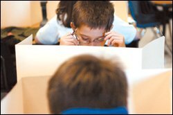 Silas Bender, a 3rd graders at London Towne Elementary School in Centreville, Va., takes a benchmark test.