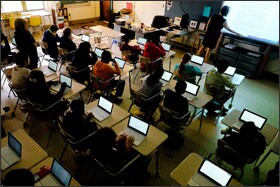 Chromebook screens glow in a 6th grade English class at Ridgeview Middle School in Gaithersburg, Md.