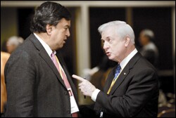Former North Carolina Gov. James B. Hunt Jr., right, talks to Gov. Bill Richardson of New Mexico.