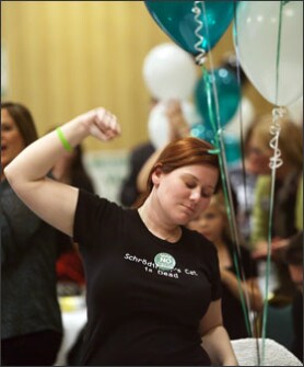 IDAHO: Jane Miceli, whose husband, Tim Miceli, teaches math at Nampa High School in Boise, celebrates the defeat in November of ballot measures on technology and teacher performance pay at an election party.