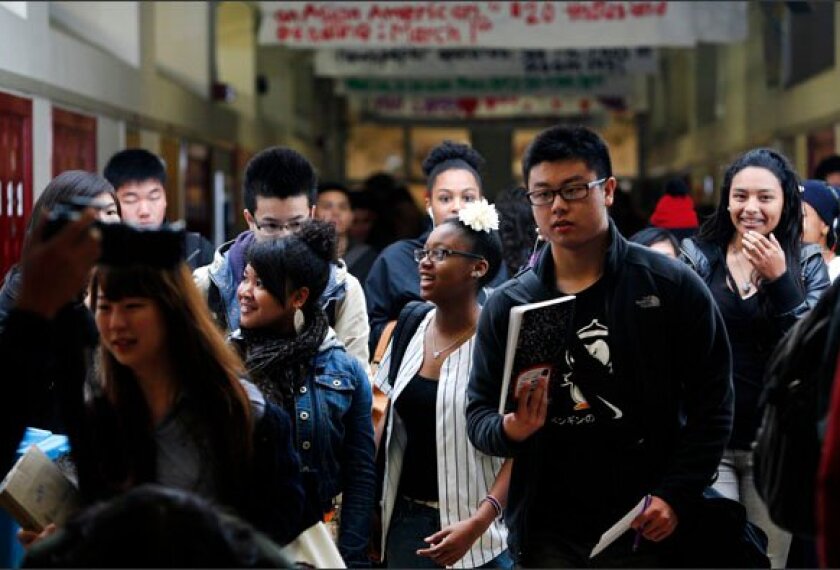 Students change classes last week at Abraham Lincoln High School in San Francisco, where students who are English-learners come from a variety of backgrounds. In California, more than 1,000 school districts can make their own rules for deciding when an English-learner has reached proficiency in the language.
