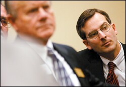 Second-year student Michael Farley, right, listens to U.S. House Committee on Education and the Workforce staff members on Capitol Hill along with LEE mentor Wally Newberry, left.