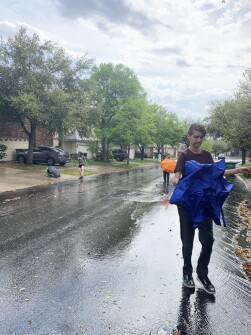 Julie Carter’s four boys (grades 3, 5, 6, and 9) have been spending time playing in the rain while waiting for their teachers to post their work as the district starts distance learning.