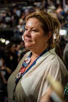 Kim Cubin, from Washington, D.C., tears up as Hillary Clinton is named the first woman presidential nominee of a major party on the second night of the Democratic National Convention.