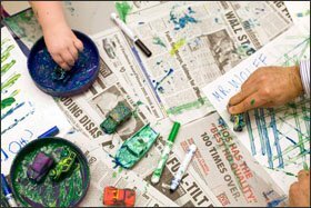 Mr. Wolff paints with Chloe Verrochi, 5. Having children as young as age 3 in the building can be “fabulous,” he said.