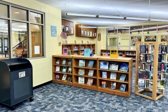 A look at some of the new books Leigh Knapp brought into Bethune Academy's school library in Milwaukee.