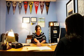 Counselor Lani E. Advokat discusses the college application process with junior Susana Delgadillo.