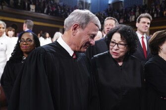 Chief Justice John Roberts, front left, and Justice Sonia Sotomayor, front right, talk as Justice Ketanji Brown Jackson, back left, looks on before President Joe Biden delivers the State of the Union address to a joint session of Congress at the Capitol, Thursday, March 7, 2024, in Washington.