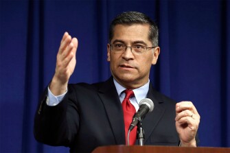 FILE - In this March 5, 2019, file photo, California Attorney General Xavier Becerra speaks during a news conference in Sacramento, Calif. California is seeking to join the Justice Department in its antitrust lawsuit against Google parent Alphabet Inc., one of the state's largest businesses. State Attorney General Xavier Becerra filed the motion to join the case in federal court on Friday, Dec. 11, 2020.