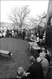 ESEA Launch: President Lyndon B. Johnson (seated at table) addresses a crowd at the signing of the Elementary and Secondary Education Act of 1965 at his former one-room school, Junction Elementary School in Johnson City, Texas. The centerpiece education law established the Title I program for disadvantaged students.