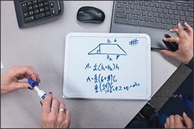 At Nathan Hale Middle School in Norwalk, Conn., students get individualized “playlists” of lessons, which are determined by a computer.
