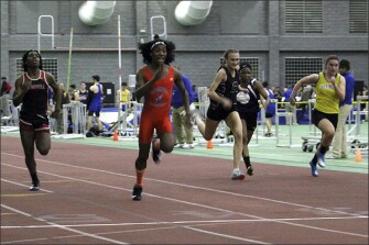 In this Feb. 7, 2019, photo, Bloomfield High School transgender athlete Terry Miller, second from left, wins the final of the 55-meter dash over transgender athlete Andraya Yearwood, left, and other runners in the Connecticut girls Class S indoor track meet at Hillhouse High School in New Haven, Conn.