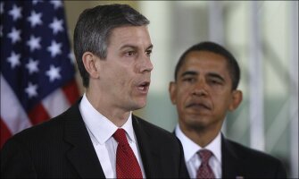 President-elect Barack Obama looks on as his Education Secretary-designate Arne Duncan speaks during a news conference in Chicago in this Dec. 16, 2008 file photo.